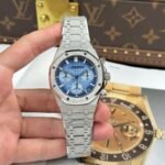 Dong-Ho-Audemars-Piguet-Rep-11-Royal-Oak-Chronograph-Frosted-Gold-26240-Mat-Xanh-Blue-APS-41mm-1.jpg