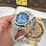 Dong-Ho-Audemars-Piguet-Rep-11-Royal-Oak-Chronograph-Frosted-Gold-26240-Mat-Xanh-Blue-APS-41mm-1.jpg