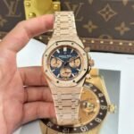 Dong-Ho-Audemars-Piguet-Replica-11-Royal-Oak-Chronograph-Frosted-Gold-26240-Mat-Xanh-Blue-Xuong-APS-41mm-11.jpg