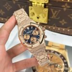 Dong-Ho-Audemars-Piguet-Replica-11-Royal-Oak-Chronograph-Frosted-Gold-26240-Mat-Xanh-Blue-Xuong-APS-41mm-11.jpg