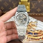 Dong-Ho-Audemars-Piguet-Replica-11-Royal-Oak-Jumbo-Extra-thin-Openworked-16204-Mat-Lo-Co-Mau-Trang-Nha-May-ZF-39mm-1.jpg