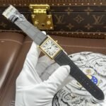 Dong-Ho-Cartier-Tank-Louis-Fake-11-Mat-Trang-Day-Da-Mau-Xam-27.8×38-12.jpg