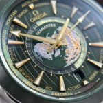 Dong-Ho-Omega-Aqua-Terra-Worldtimer-Replica-11-Mau-Xanh-La-Cay-Day-Cao-Su-Xuong-VS-43mm-1.jpg