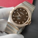 Dong-Ho-Omega-Constellation-Co-Axial-Fake-11-Demi-Vang-Hong-Mat-Nau-38mm-2.jpg