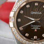Dong-Ho-Omega-Constellation-Co-Axial-Fake-11-Demi-Vang-Hong-Mat-Nau-38mm-2.jpg