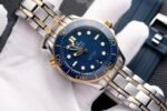 Dong-Ho-Omega-Seamaster-DemiGold-Replcia-11-Mat-Xanh-42mm-1.jpg